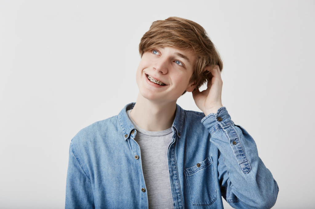 fair-haired-dreamy-hipster-guy-imagines-something-his-mind-looks-aside-smiles-being-deep-thoughts-scratching-head-attractive-hipster-guy-dreams-about-vacation-weekends-alone.jpg