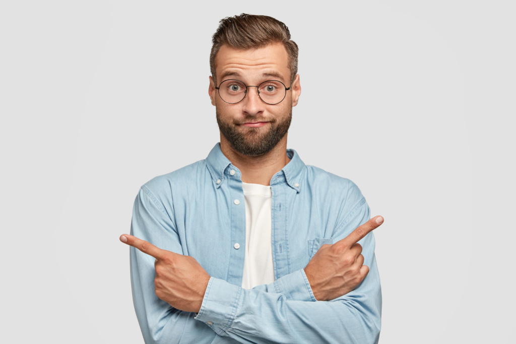 hesitant-clueless-man-crosses-hands-chest-indicates-with-index-fingers-different-sides-directions.jpg hesitant-clueless-man-crosses-hands-chest-indicates-with-index-fingers-different-sides-directions.jpg